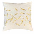 Wynstead embroidered linen pillow cover, photographed on a warm neutral surface